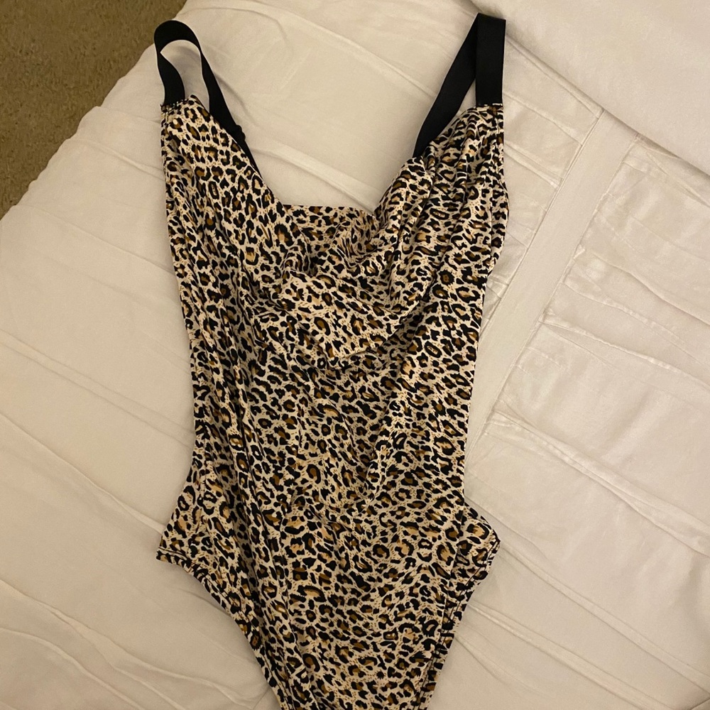 Cheetah print bodysuit! NEVER WORN! BRAND NEW!
